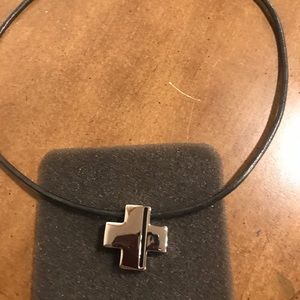 Lia Sofia cross necklace on black cord.